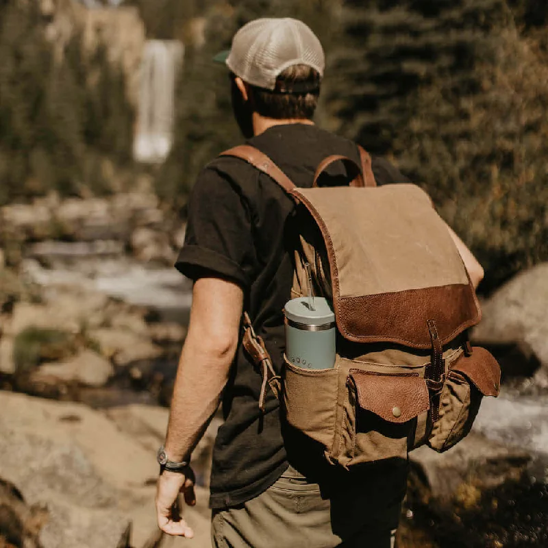 Compact travel backpack with a padded laptop sleeve for digital nomadsCampaign Waxed Canvas Backpack