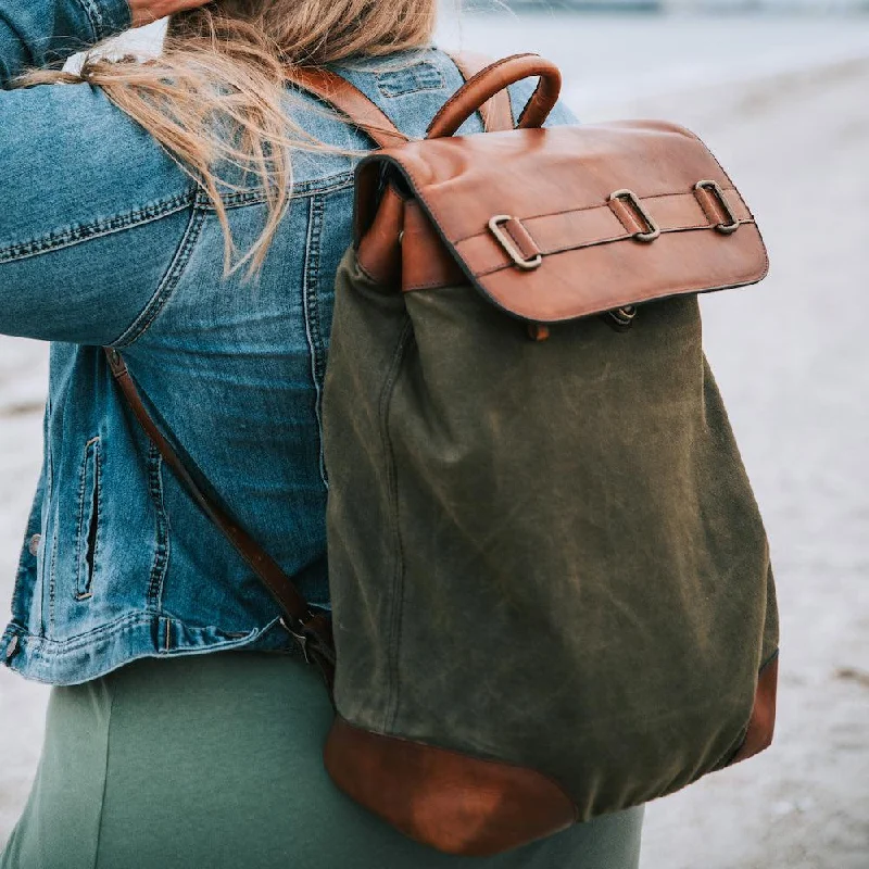 Hardshell travel suitcase with a TSA-approved lock for air travelHeritage Waxed Canvas Steamer Backpack No. 2