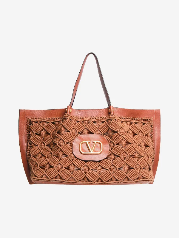 Embroidered Tote Bag in Beige with Floral Motifs for a Boho - Chic VibeBrown crochet and leather VLogo Escape tote bag