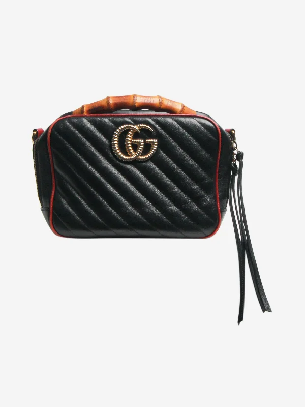 Leather Shoulder Bag with Magnetic Closure in Black for Quick AccessBlack GG Marmont shoulder bag with bamboo handle