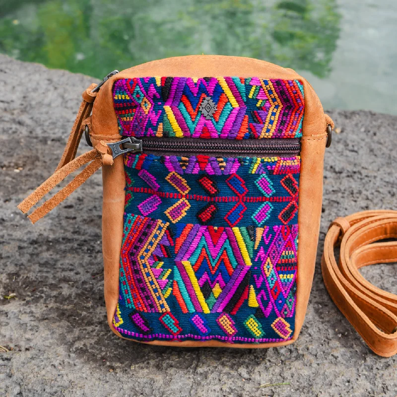 Compact travel backpack with a padded laptop sleeve for digital nomadsCROSSBODY TRAVEL BAG - OOAK HUIPIL - BOURBON - NO. 13151